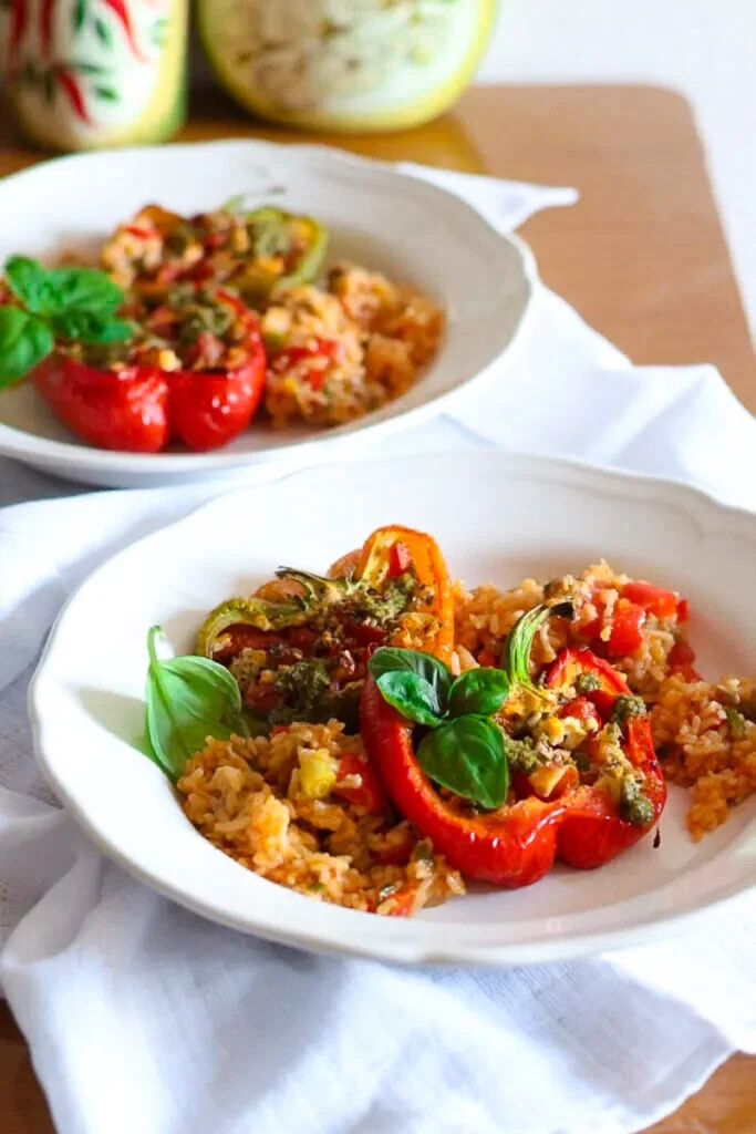Italian Roasted Peppes stuffed with tomatoes and goat's cheese served with rice