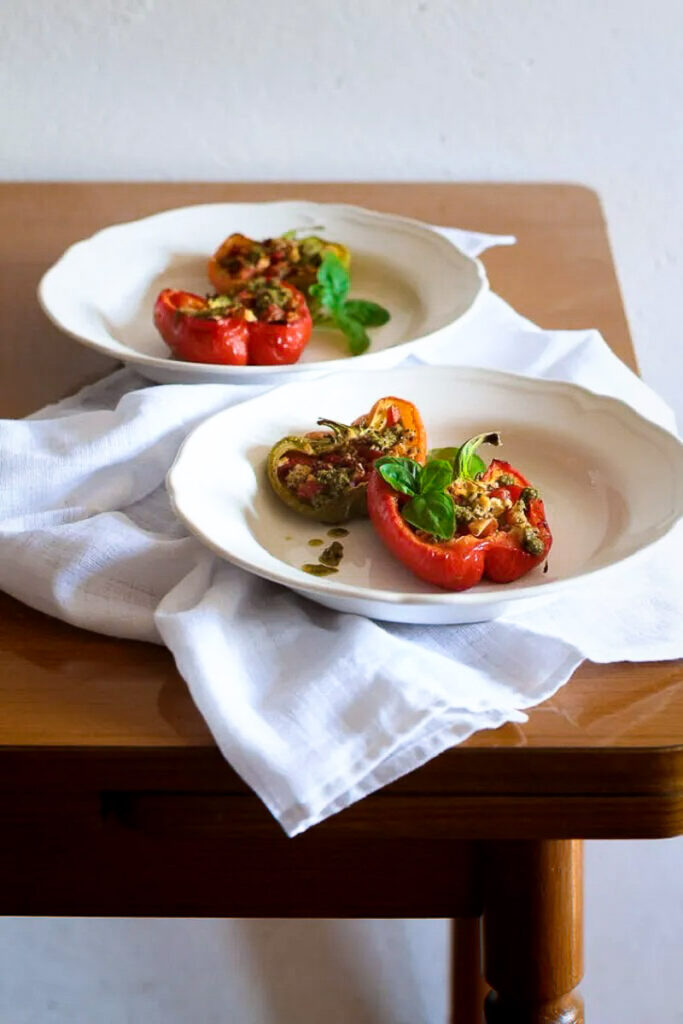Italian Roasted Peppes stuffed with tomatoes and goat's cheese served with rice