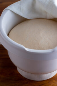 Risen dough in a bowl.