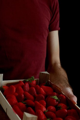 Jay holding strawberries