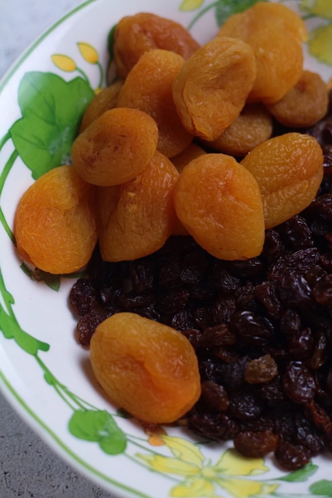 Apricots and Raisins in a bowl.