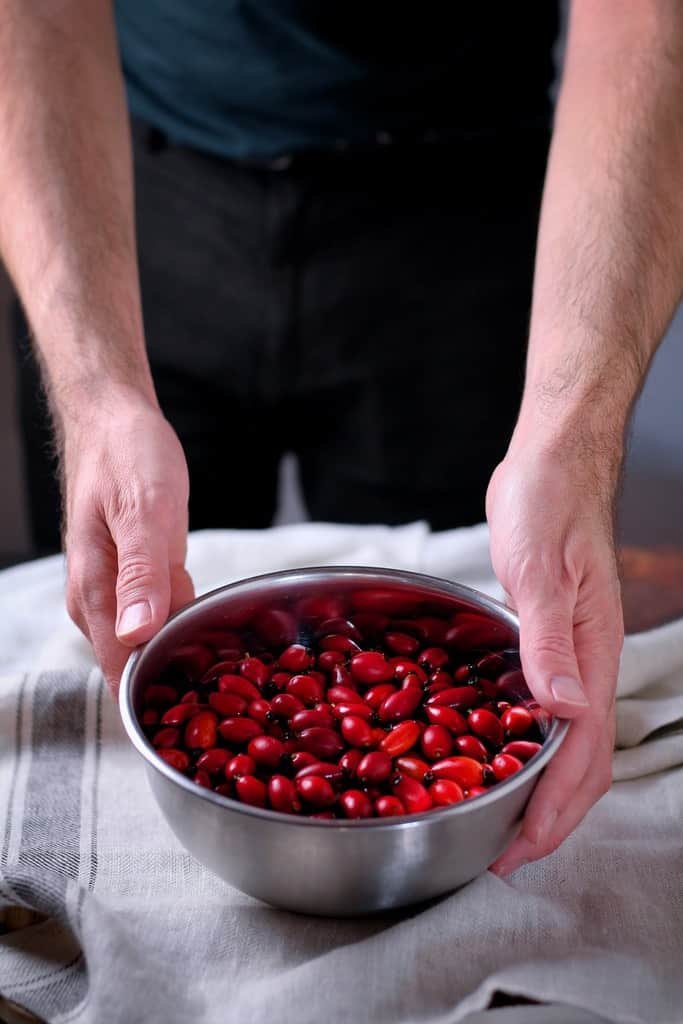 A picture of rosehips in a bowl