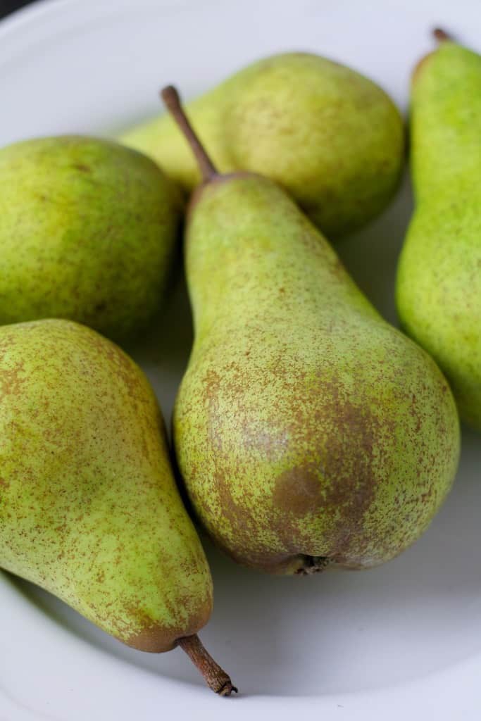 Green pears in a bowl.