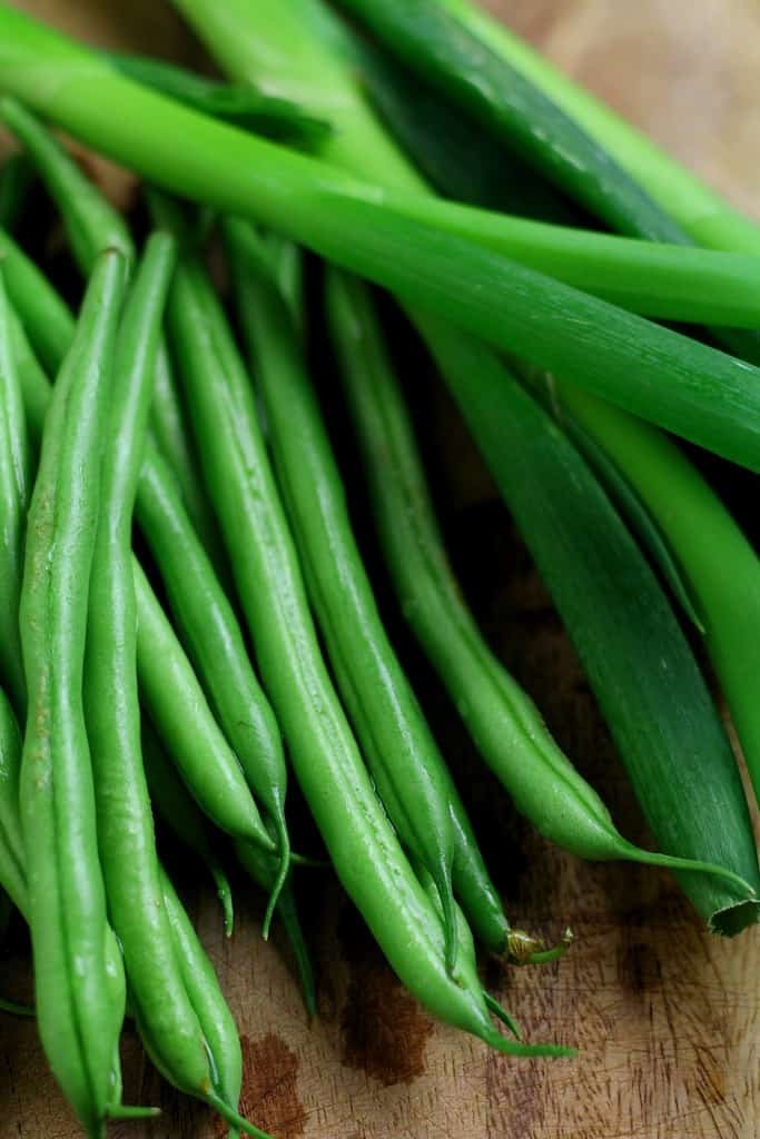 Green beans and spring onions (scallions).