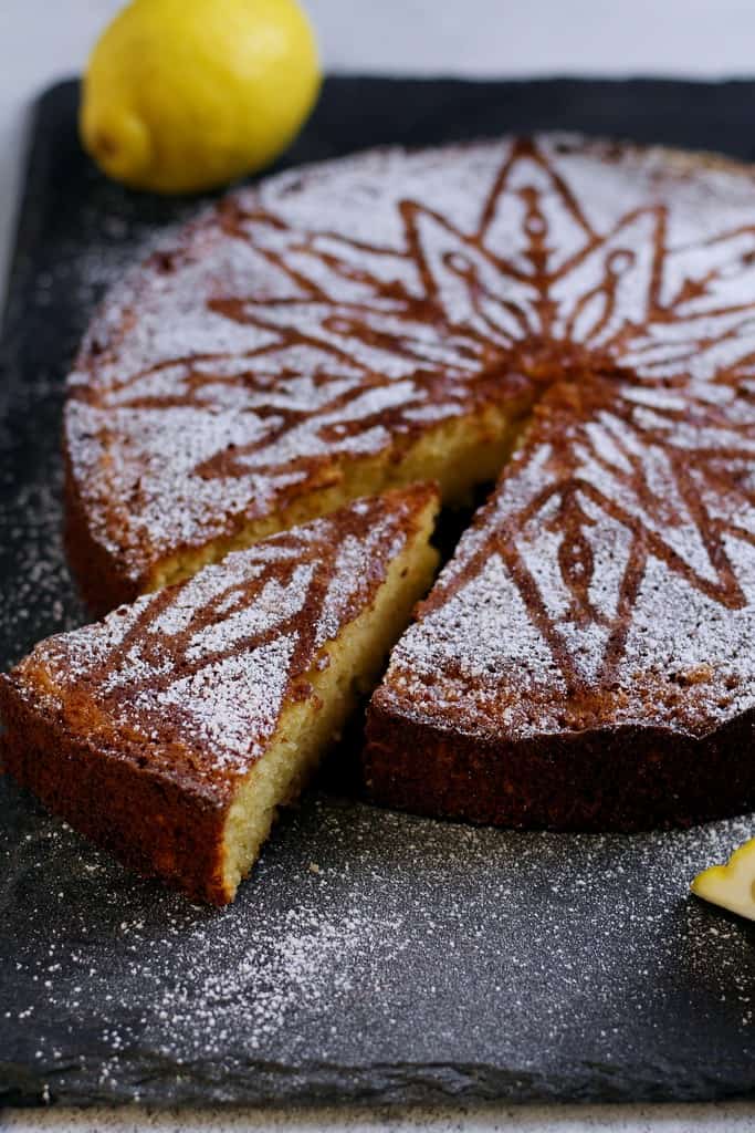 Torta Caprese al Limone is an Italian cake with a mouthwatering combination of almonds, lemon and white chocolate with a soft and fudgy interior.  