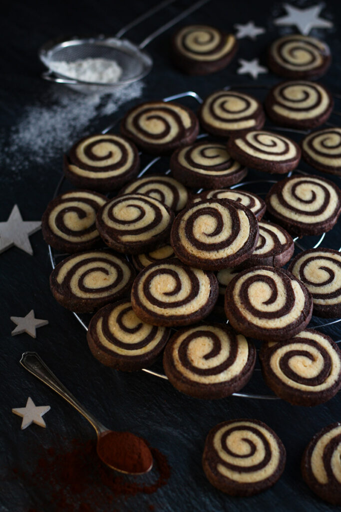 Chocolate Pinwheel Cookies on a cooling rack.