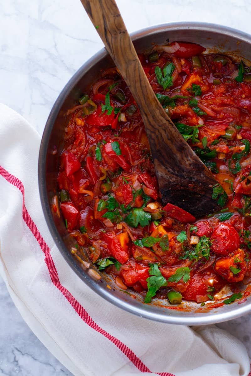 Tomato sauce for Imam Bayildi in a saucepan