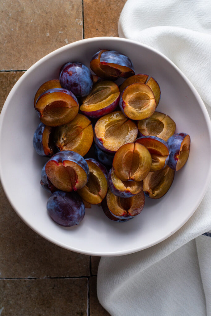 Zwetschge or prune plums in a bowl.