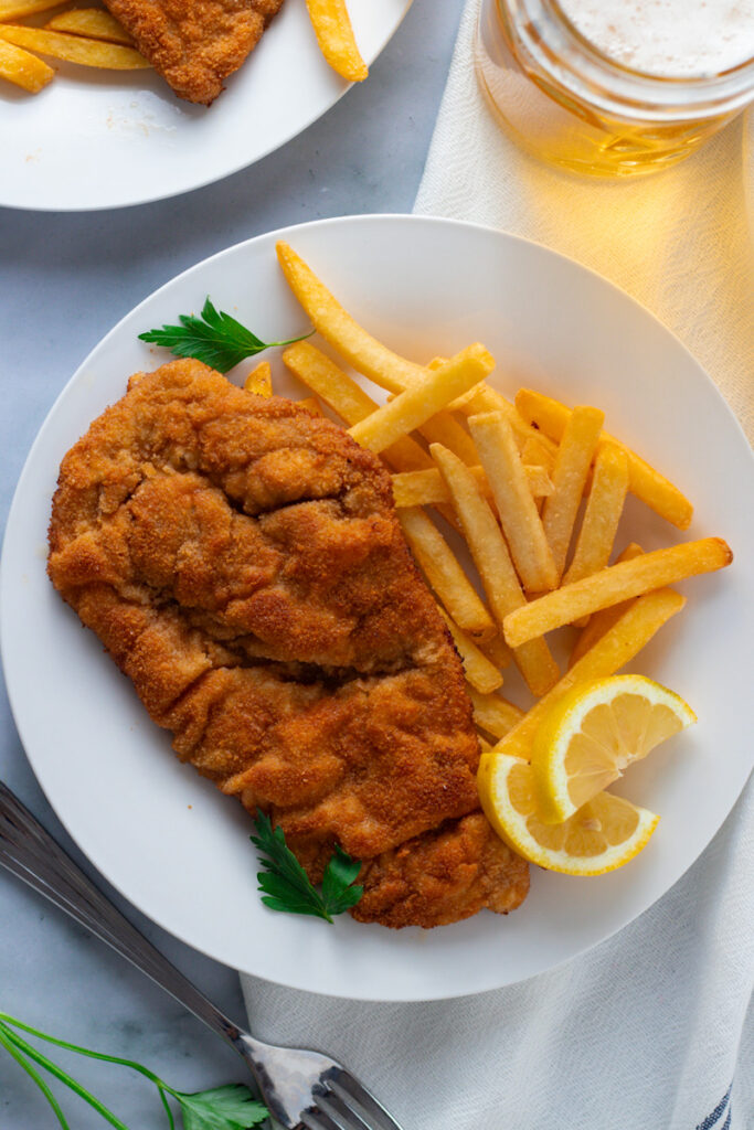 Bavarian Pork Schnitzel on a plate with fries