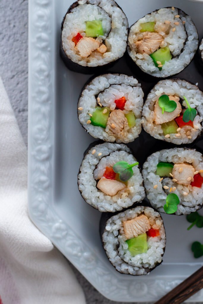 Chicken Sushi rolls seen from above.