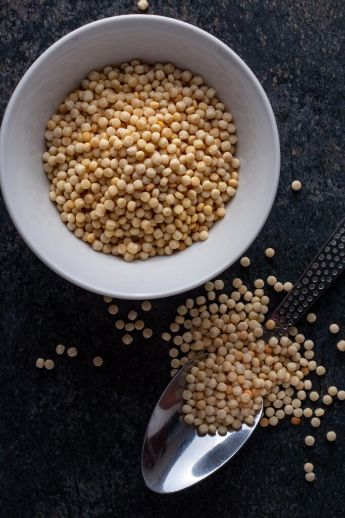 Israeli or pearl couscous in a bowl.