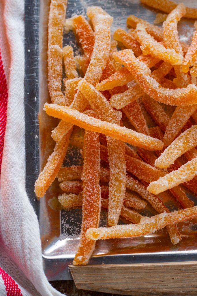 Closeup of candied peels on a tray.