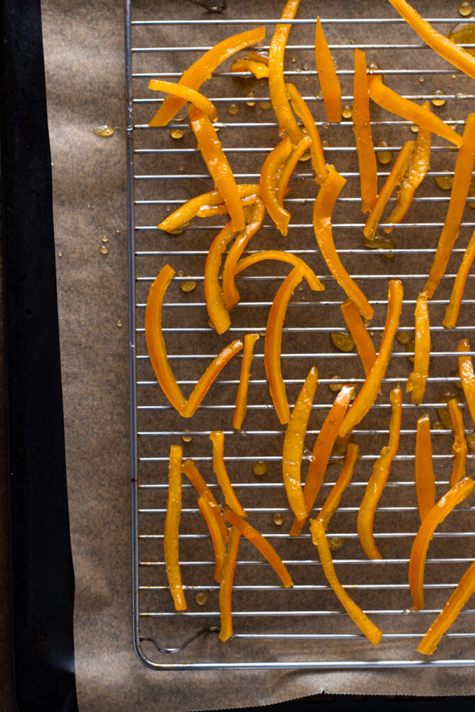 Candied Orange Peels on a drying rack.