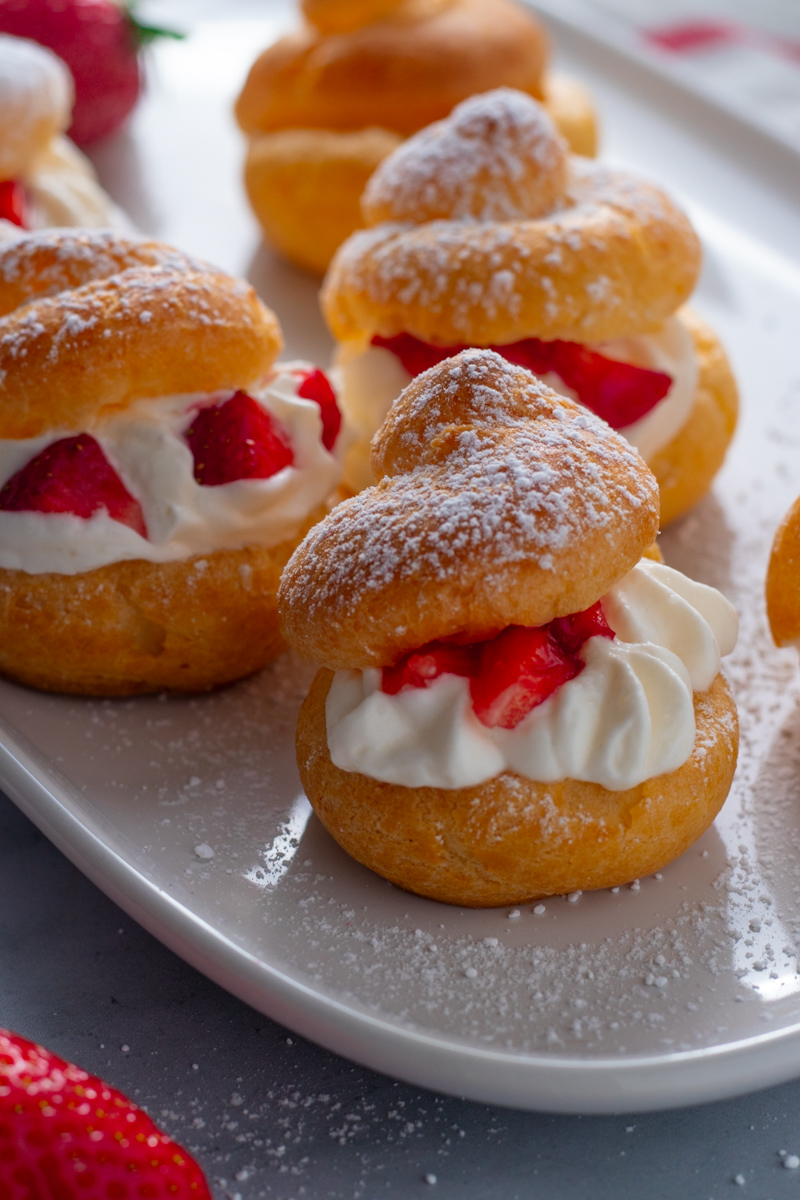 Strawberry Cream Puffs on a plate.