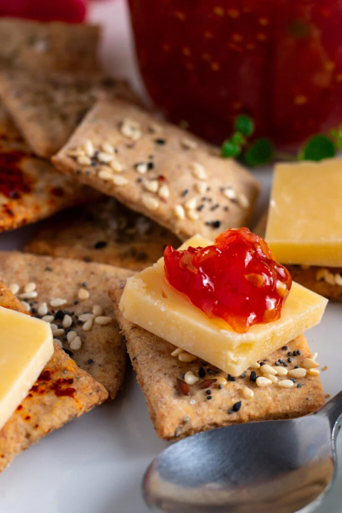 Tomato relish on cheese and crackers.