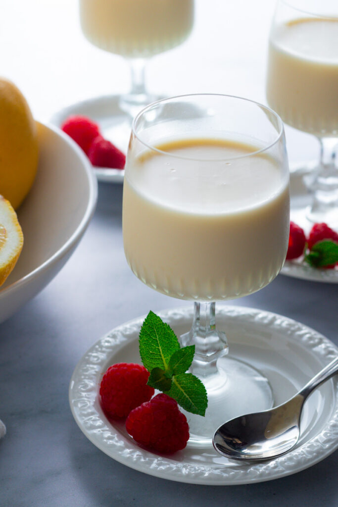 Lemon Posset in a wine glass.