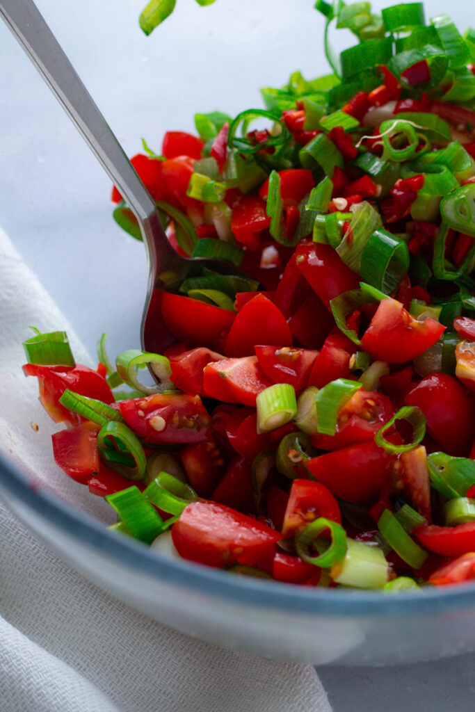 Tomato and spring onion salsa.