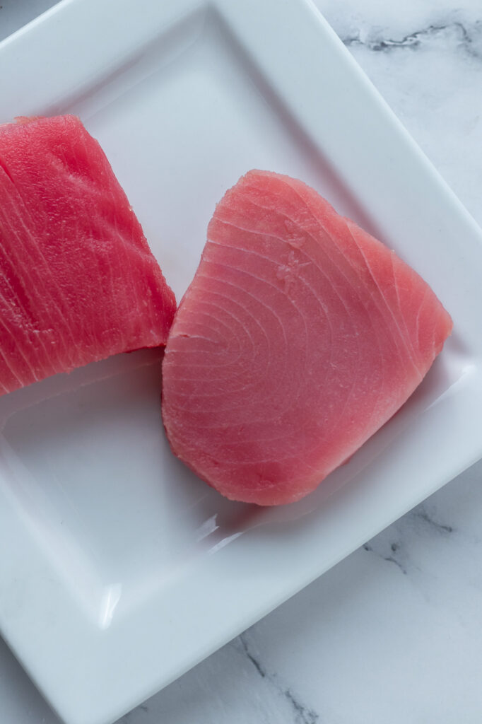 Fresh Tuna fillets on a plate.