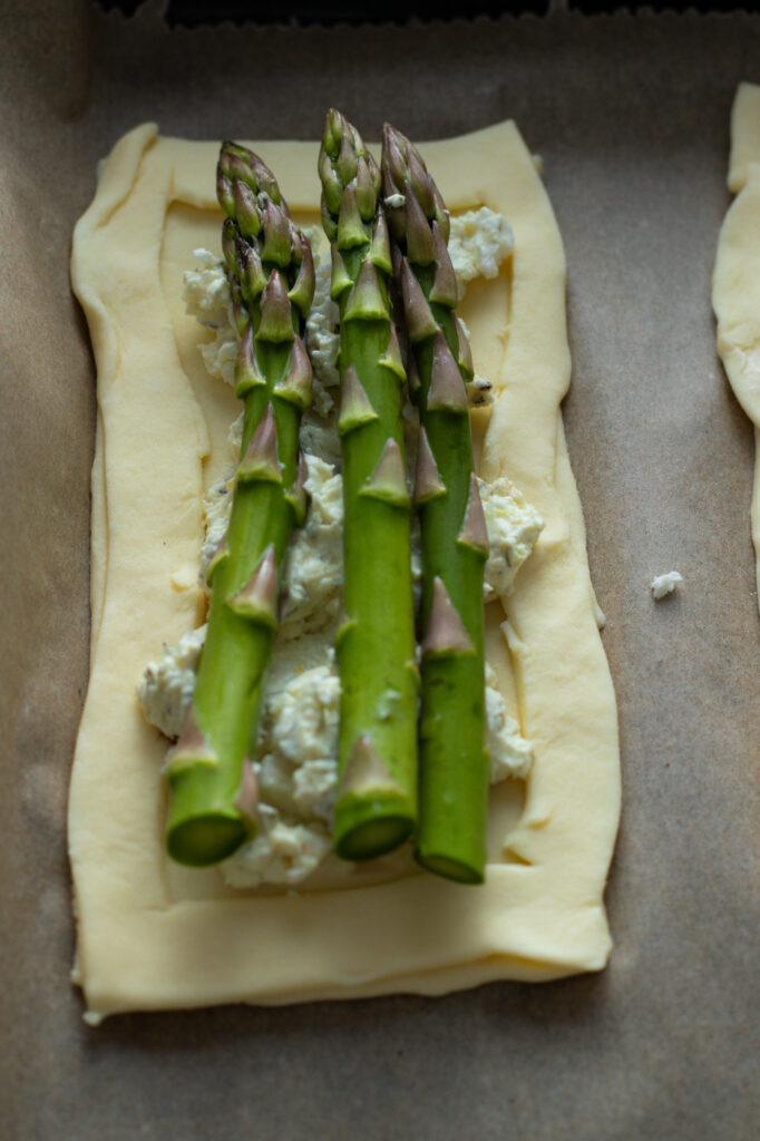 Unbaked asparagus tarts.