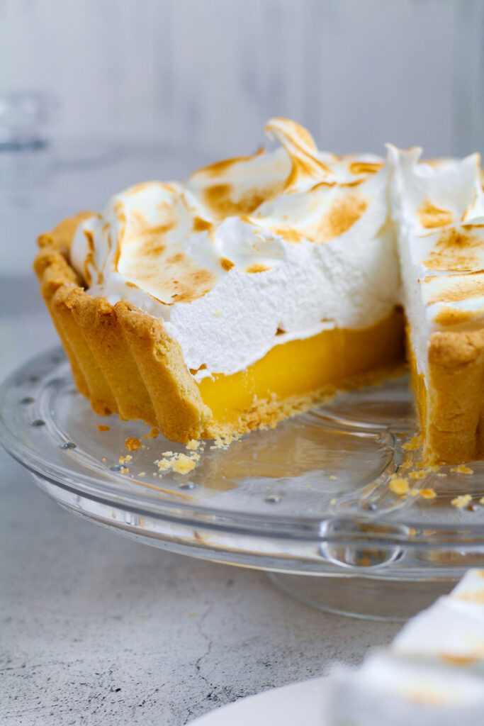 Lemon Meringue Pie sliced and seen close up.