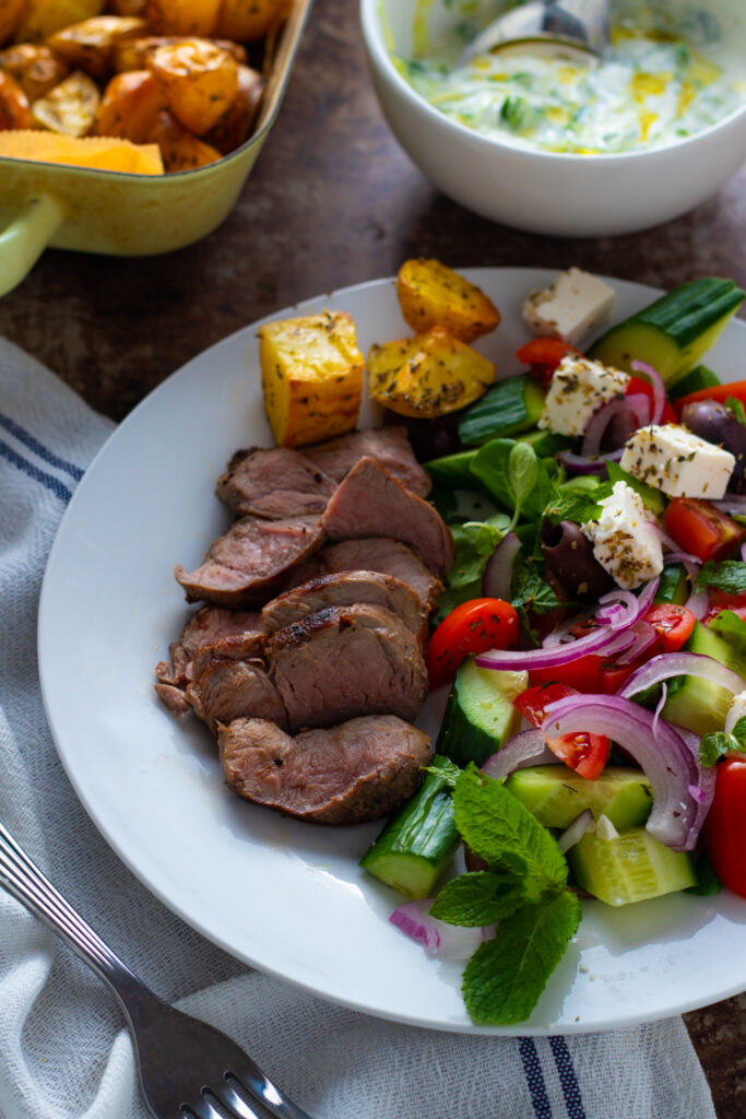 Greek Lamb Salad with Roasted Potatoes and tzatziki.