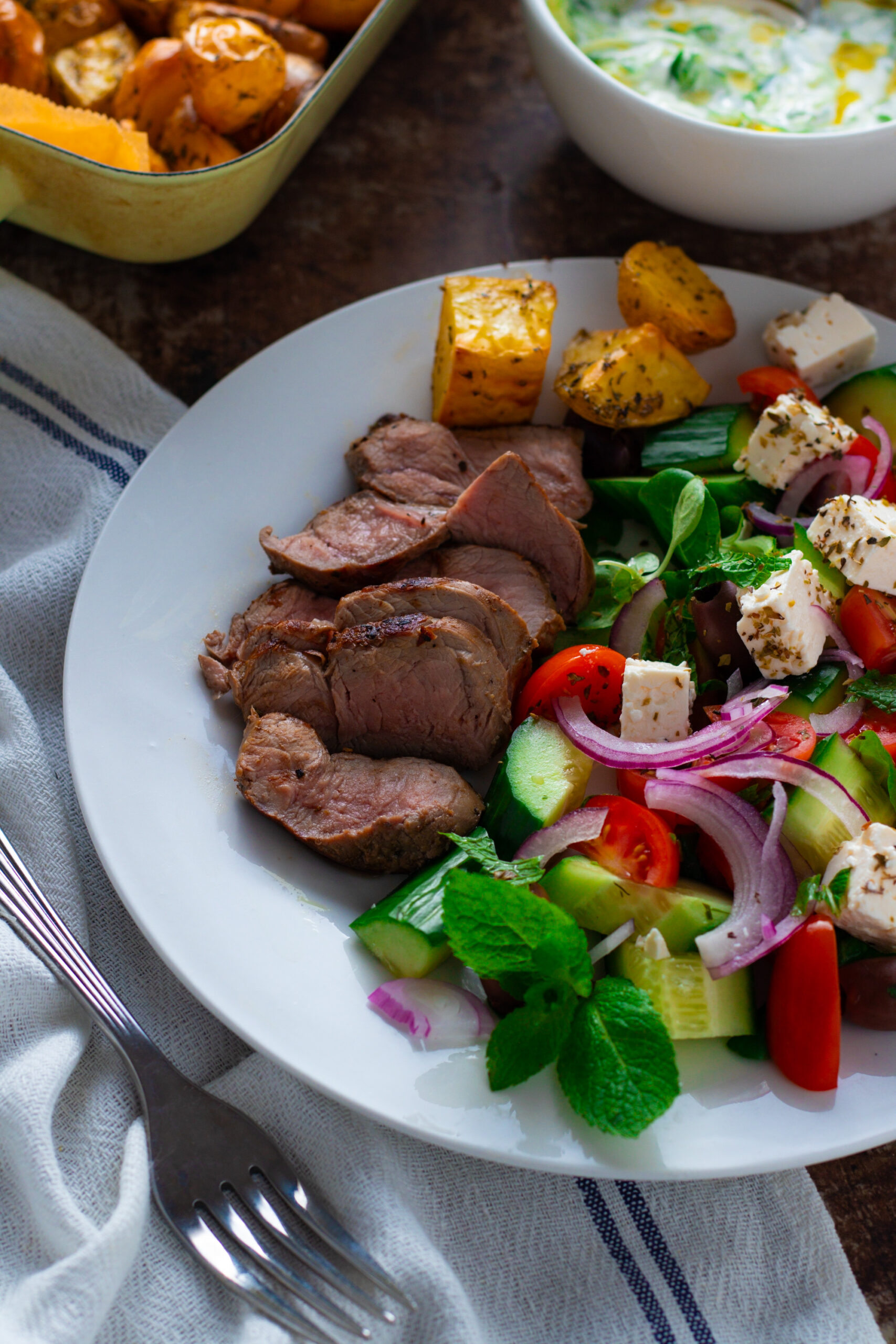 Greek Lamb Salad with Roasted Potatoes and tzatziki.