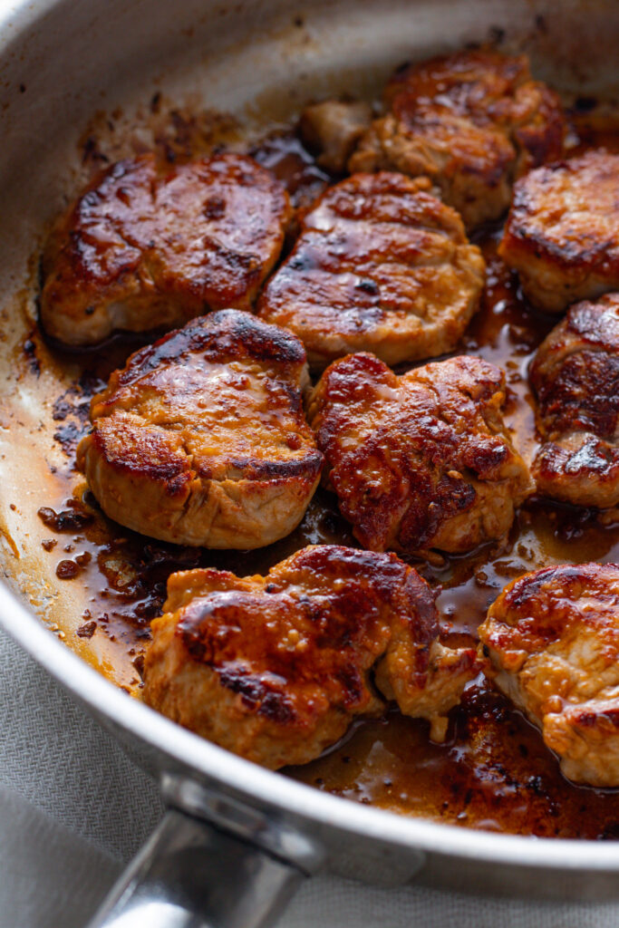 Beautifully caramelised pork tenderloin medallions.