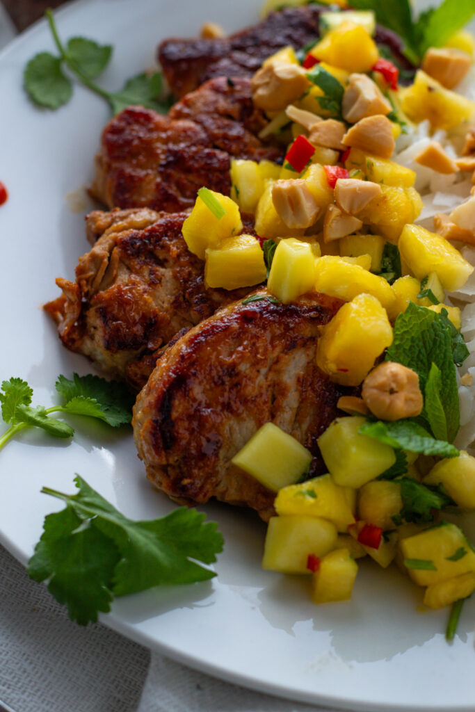 Pork tenderloin with pineapple salsa and basmati rice with fresh lime.