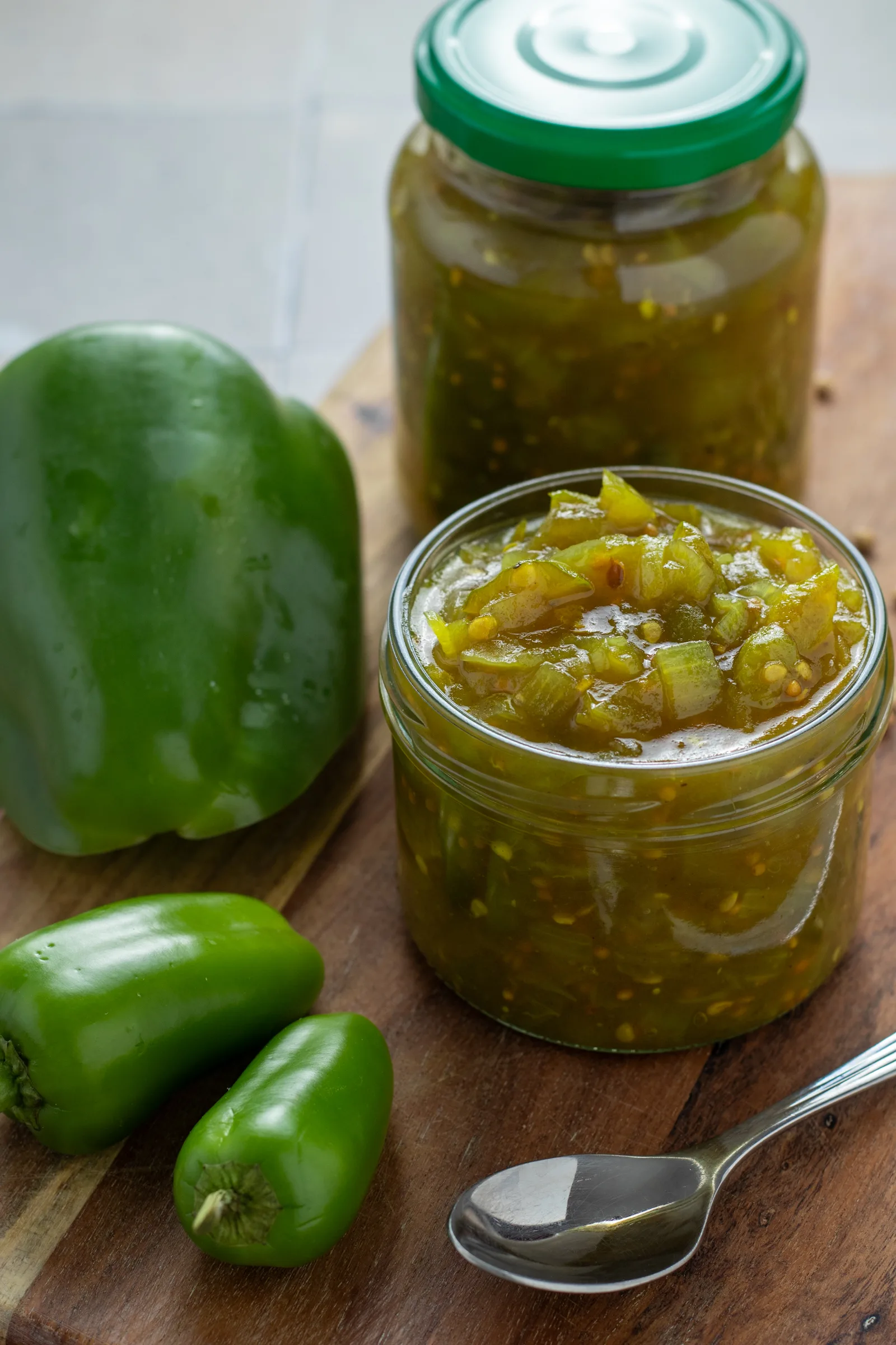 Green Tomato Relish in a jar with peppers.
